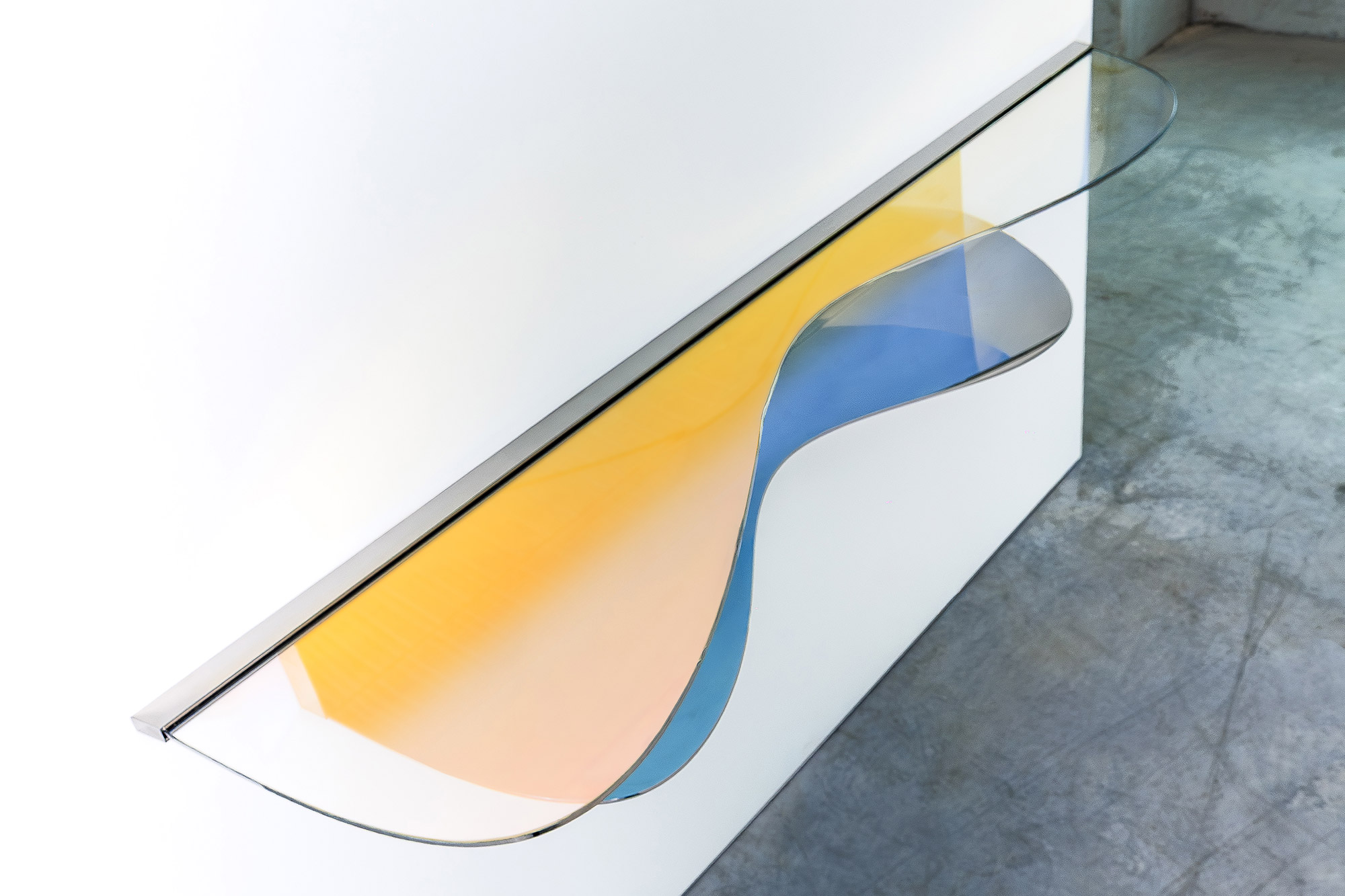 Cool-toned reflections on polished steel – C02