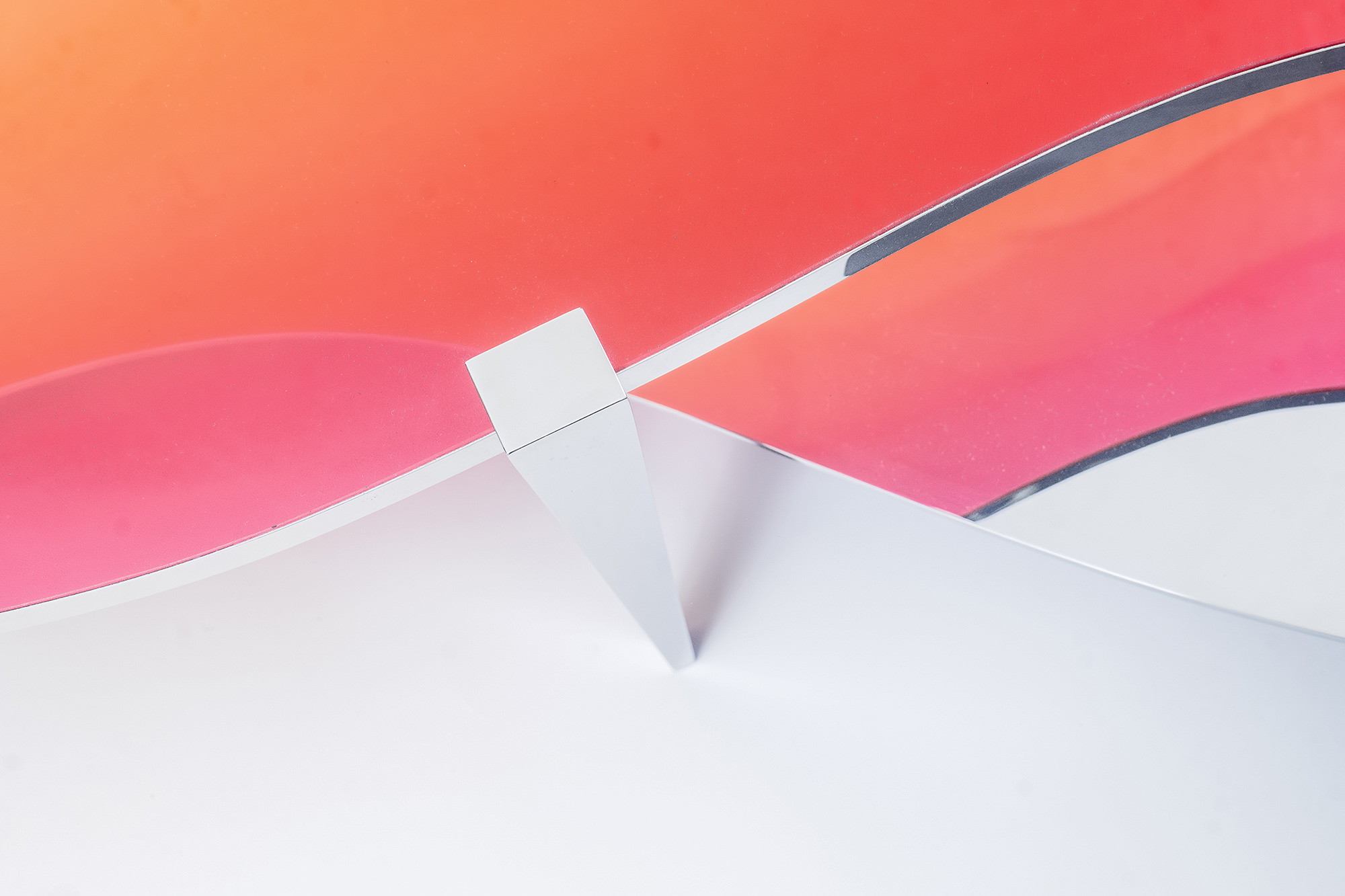 Steel legs mirroring pink and orange tones – LT01