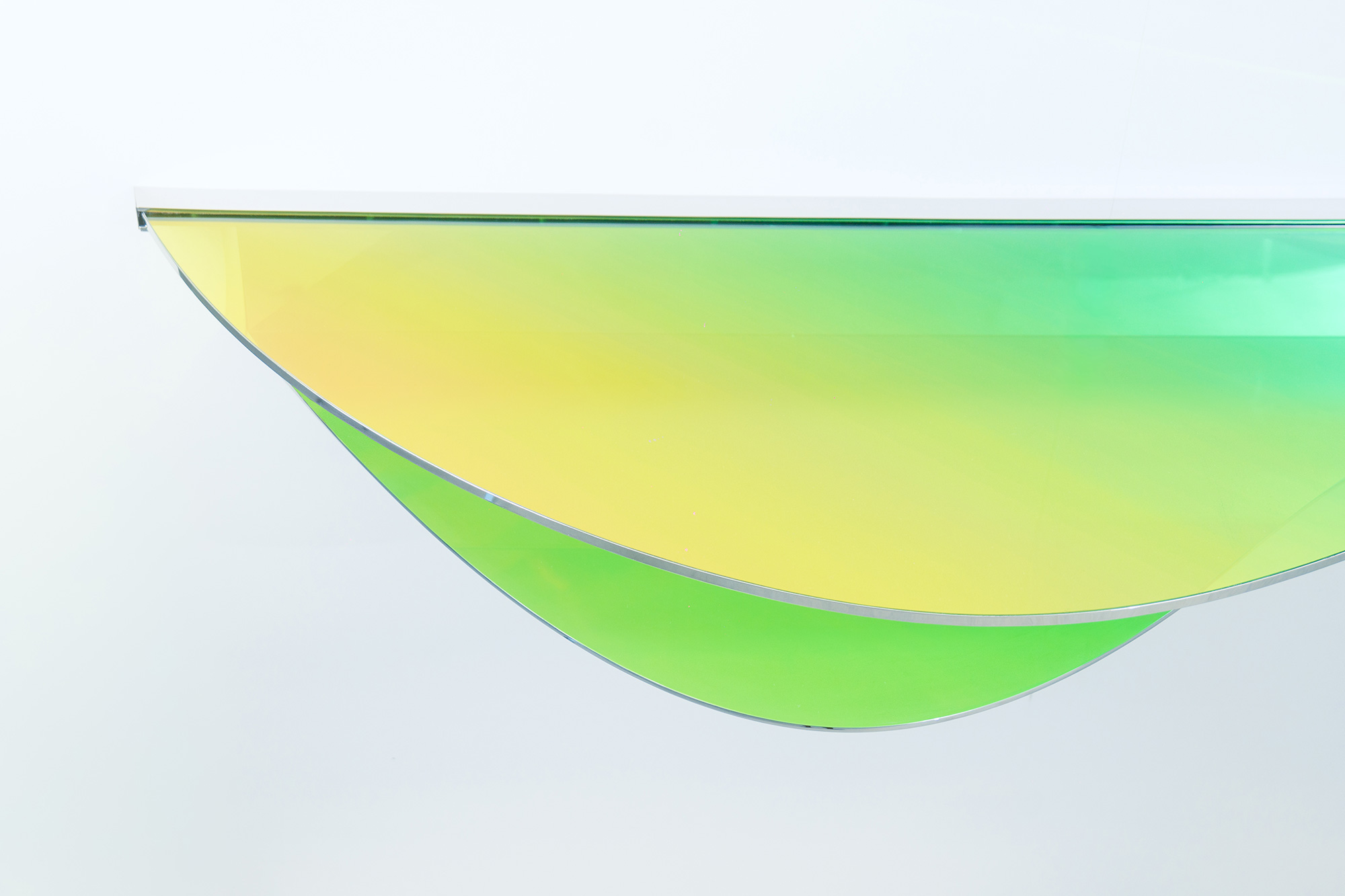 Light interacting with green dichroic surface – C03