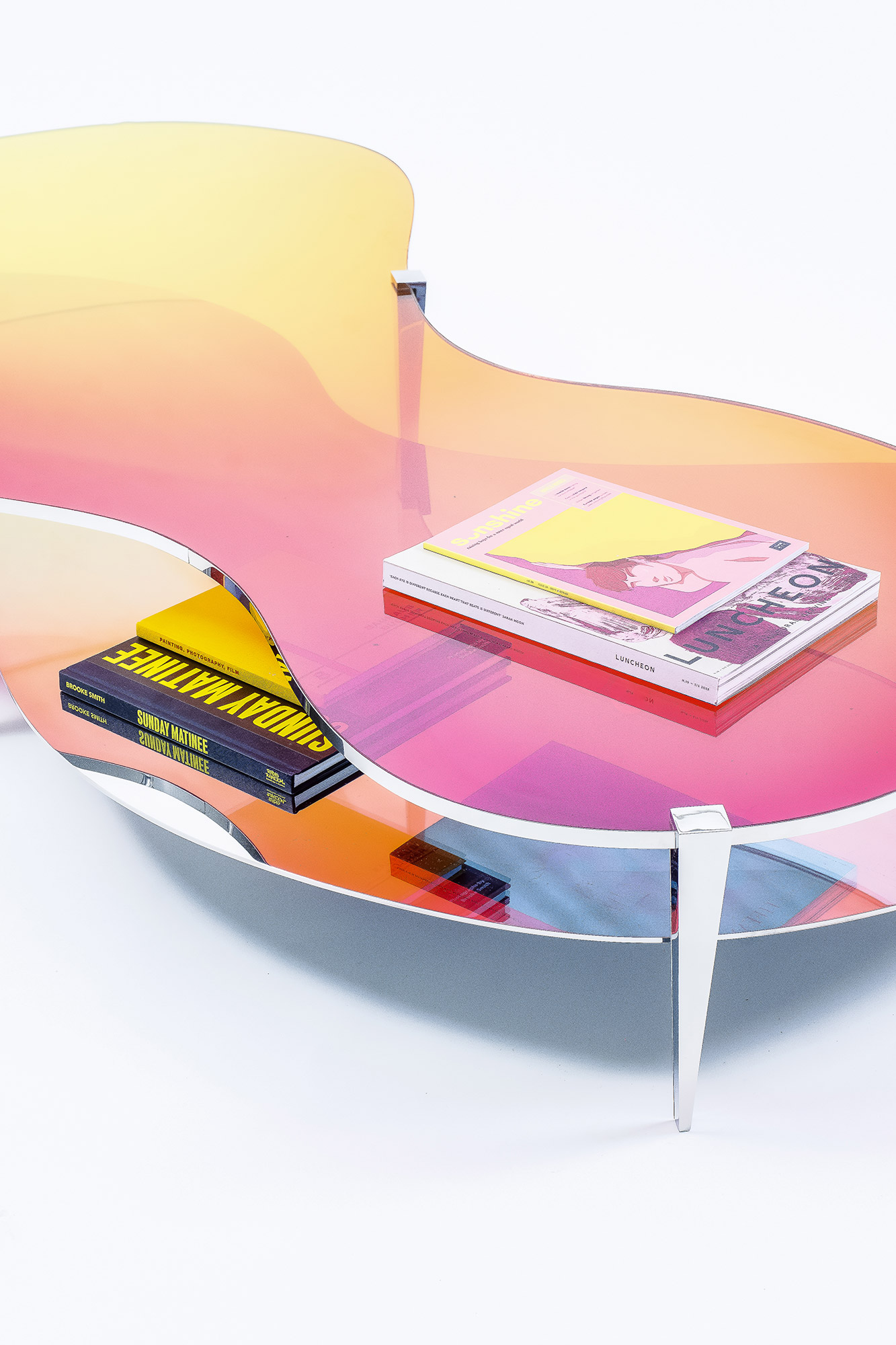 Warm orange reflections diffused through curved surfaces – LT01